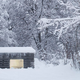 Illustration for article titled This Cozy Log Cabin in the Swiss Alps Is Completely Made of Concrete